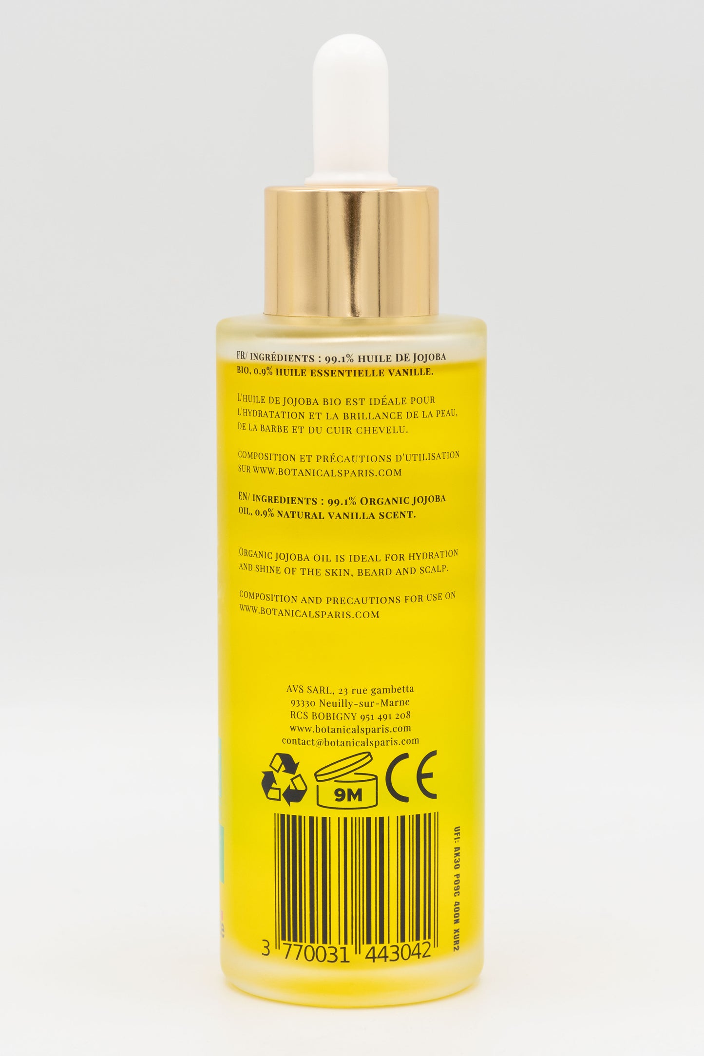 Une bouteille d'huile de jojoba bio 100ml Botanicals de dos sur fond blanc