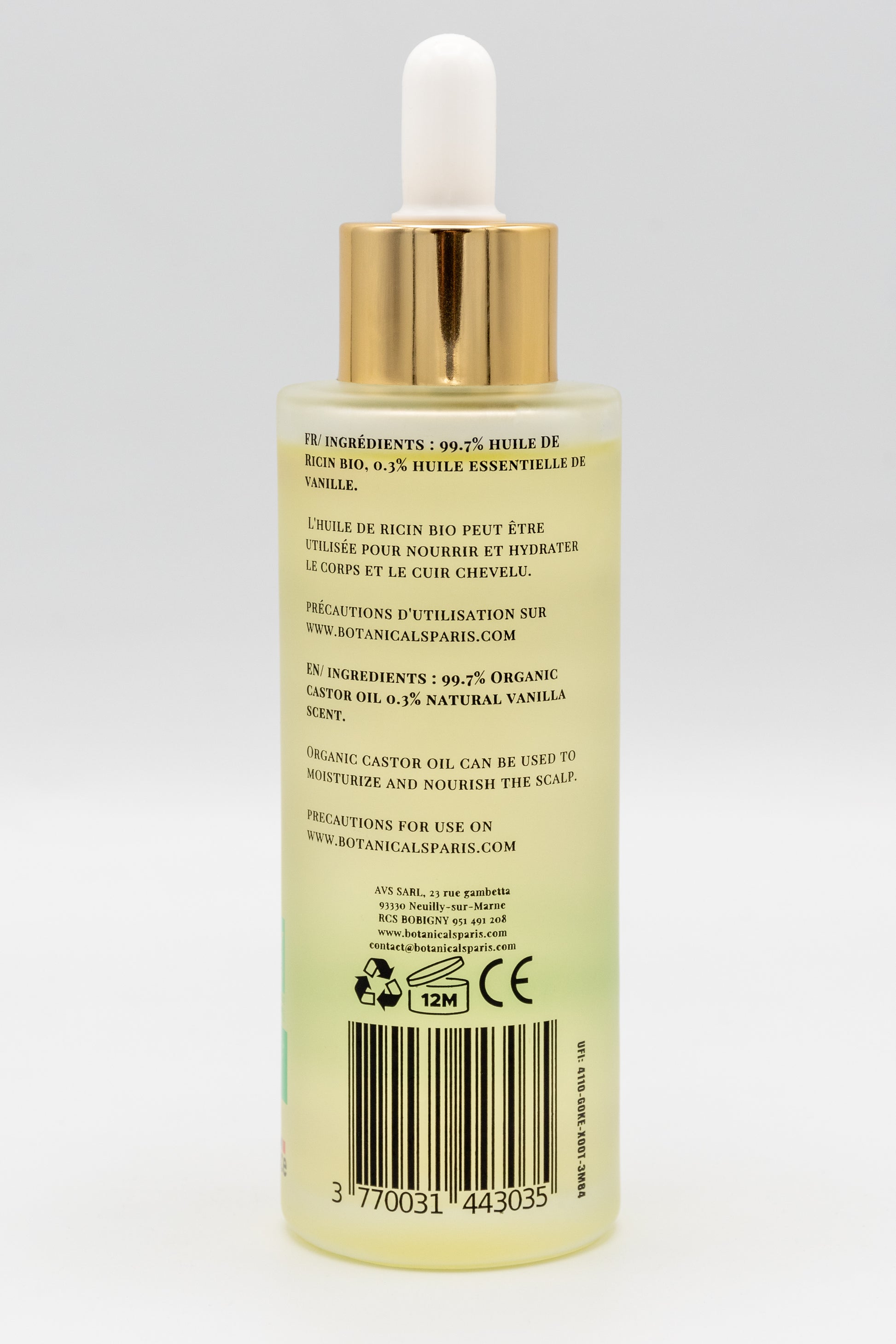 Une bouteille d'huile de ricin bio 100ml Botanicals de dos sur fond blanc