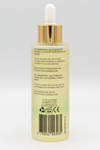 Une bouteille d'huile de ricin bio 100ml Botanicals de dos sur fond blanc