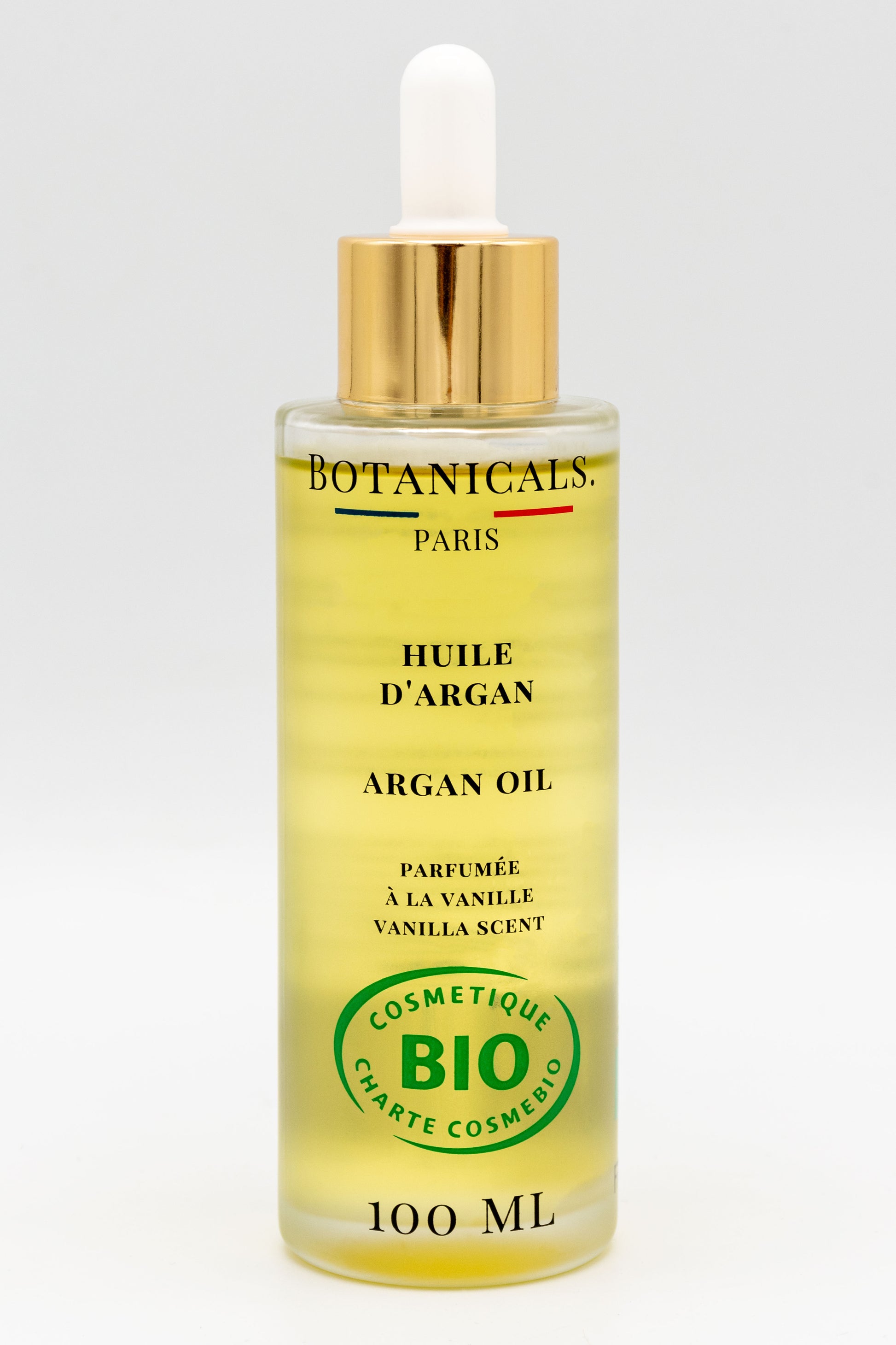 Une bouteille d'huile d'argan bio 100ml Botanicals sur fond blanc