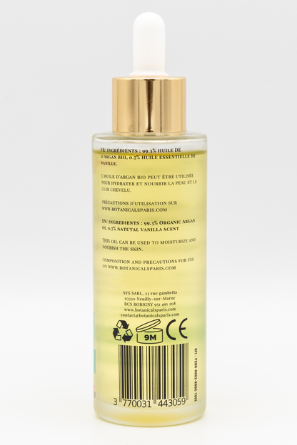 Une bouteille d'huile d'argan bio 100ml Botanicals de dos sur fond blanc