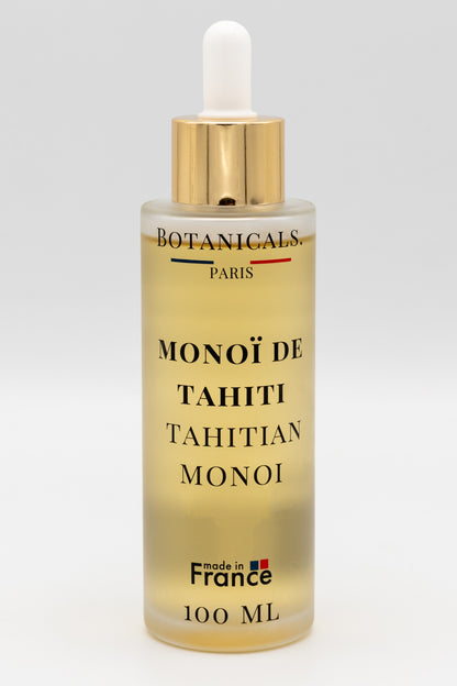 Une bouteille d'huile de monoï de Tahiti enrichi à l'huile de coco bio 100ml Botanicals sur fond blanc